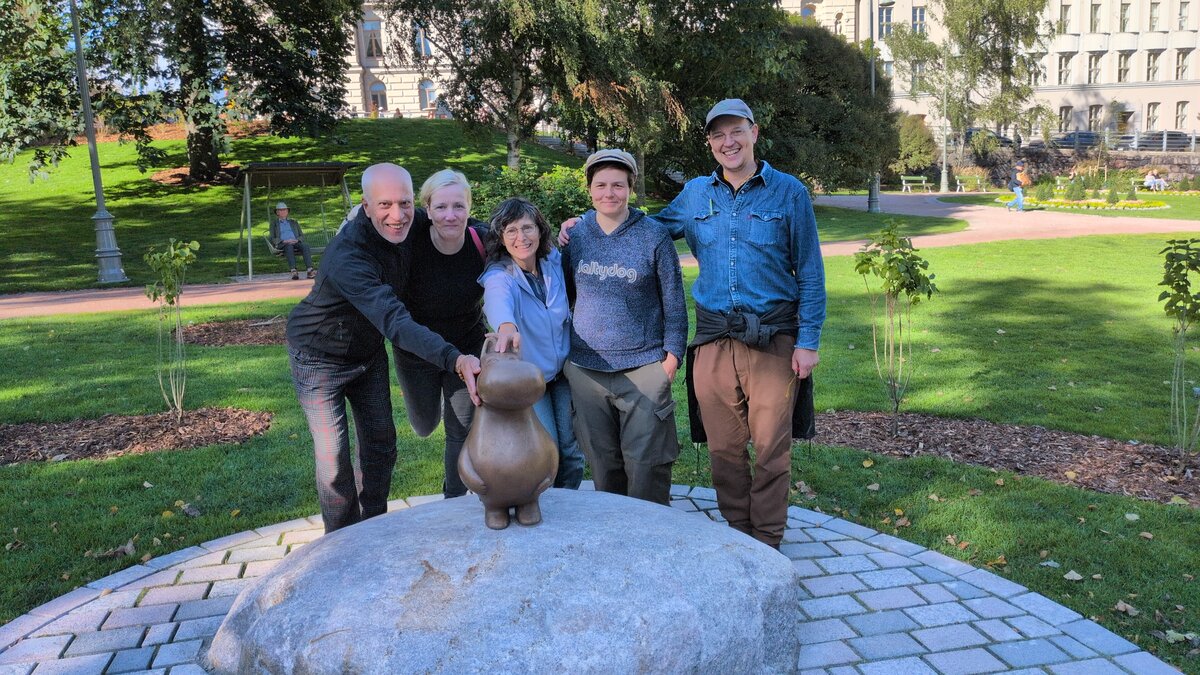 Participants of the 2026 Helsinki Street Retreat with Moomin statue