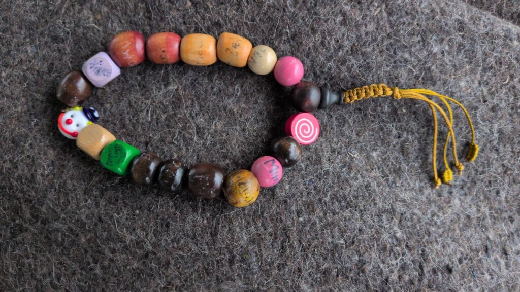Mala beads with names painted on the beads